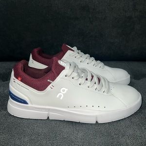 Brand new, never worn On The Roger shoes. White with Mulberry. Size 7.5.